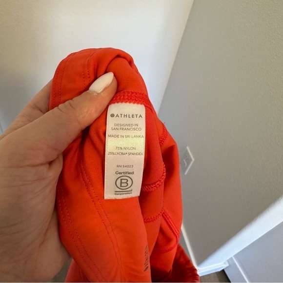 Athleta Peloton Velocity Ankle Leggings Orange Size Large Women’s Side Pockets - Picture 9 of 9